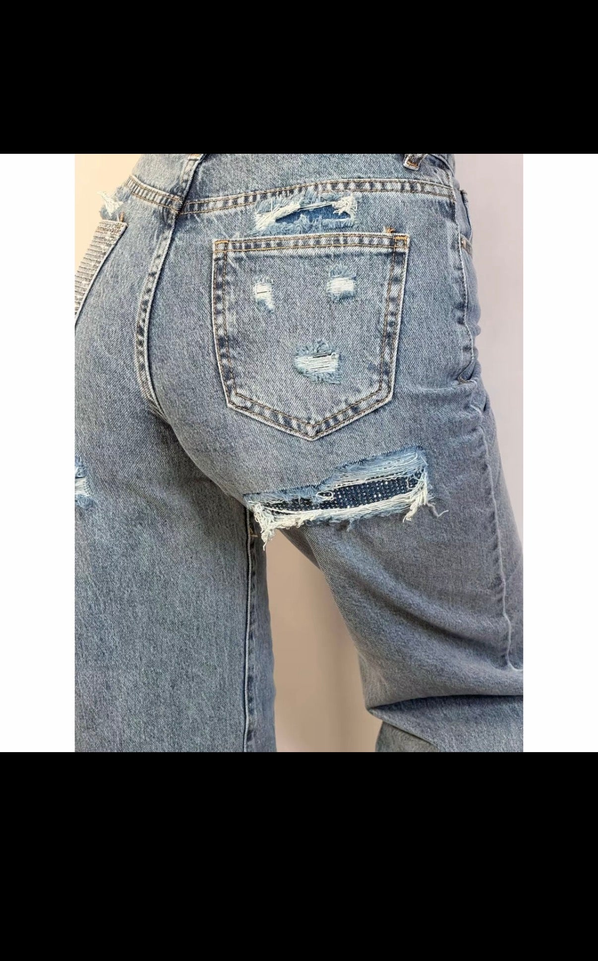 JEANS STRAPPO DIETRO